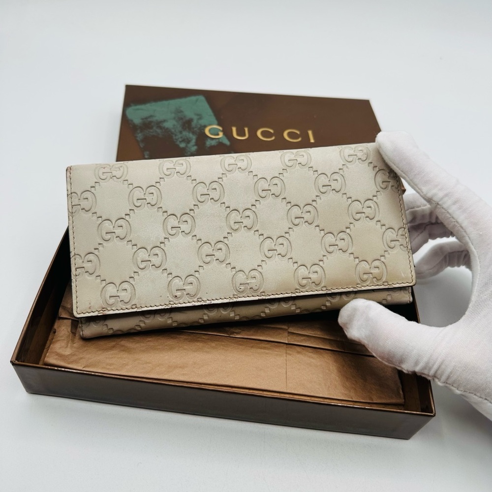 Gucci Guccissima Embossed GG Leather Wallet